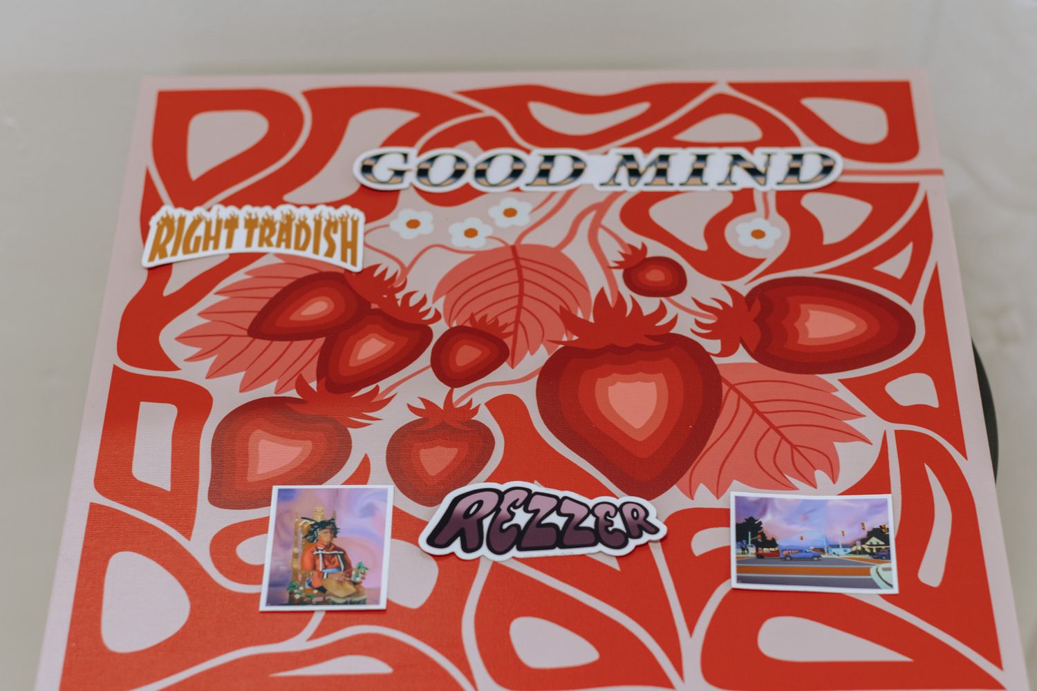 Red and white strawberry themed packaging design with bold graphic elements.