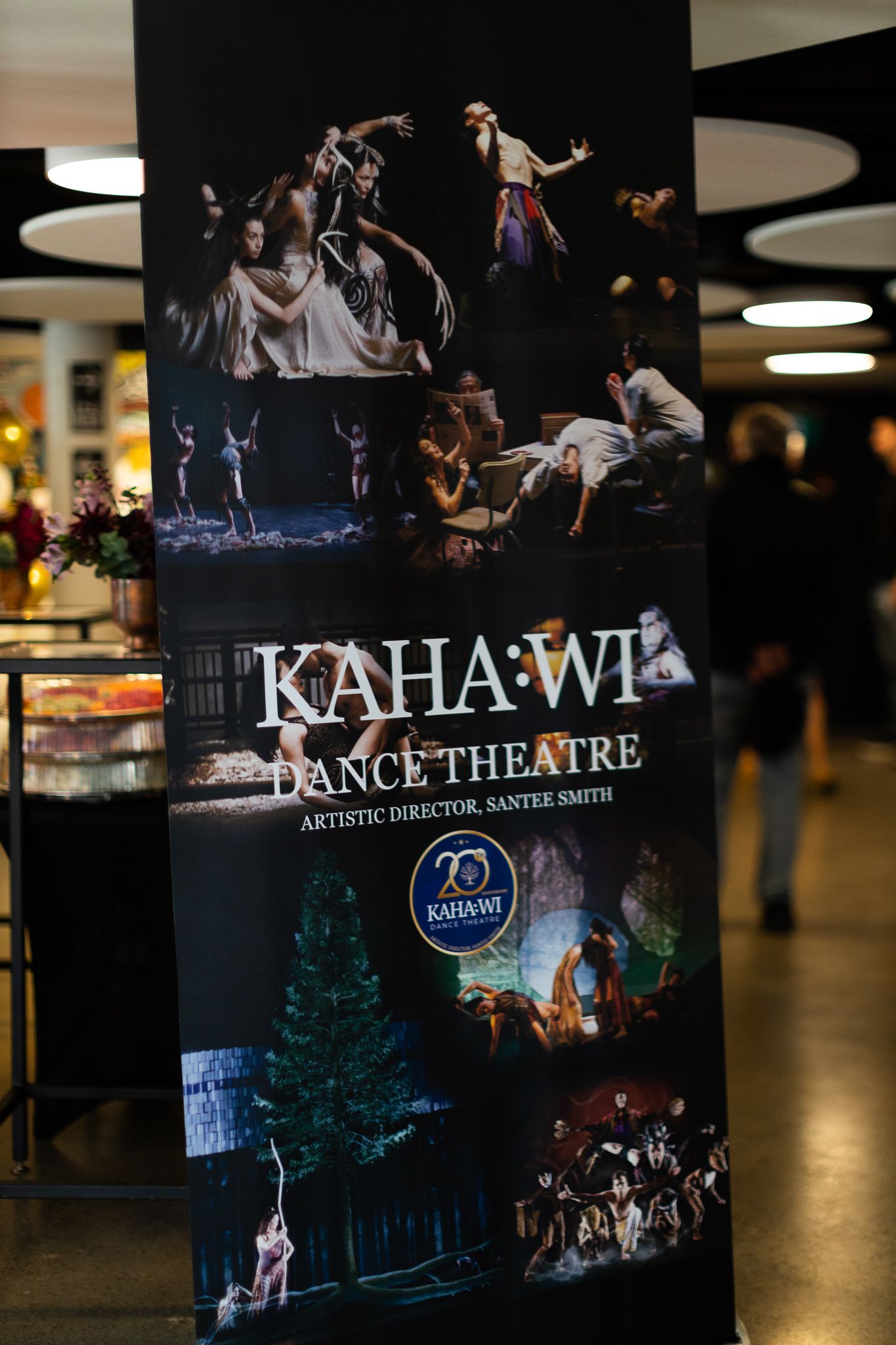 Promotional poster for Kahawi Dance Theatre showing various performance scenes and celebrating 20 years.