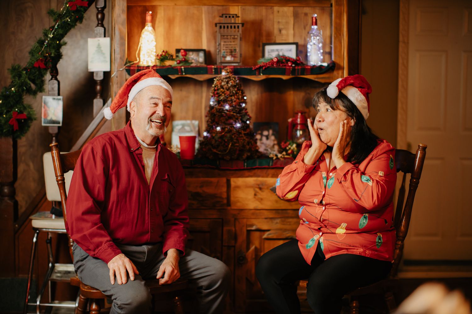 Candid holiday party moments captured in warm lighting with festive decorations.