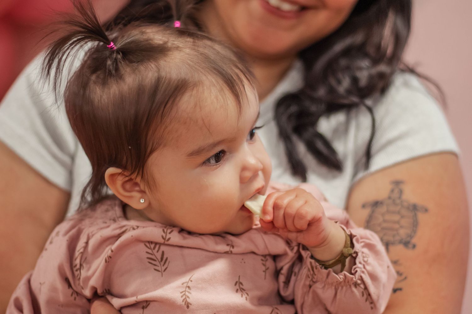 Close-up portrait showing gentle moment during birthday celebration.