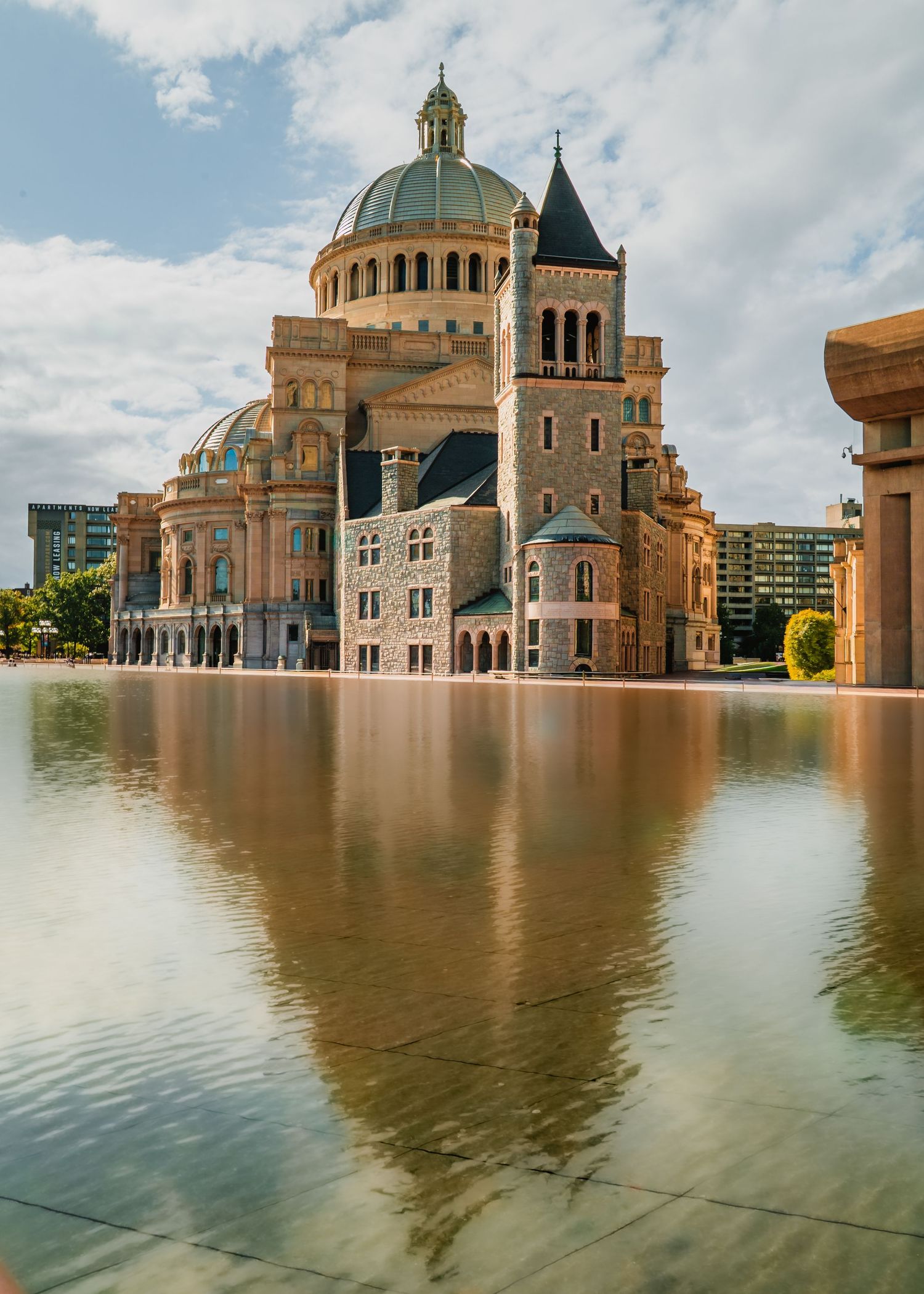 Large domed church buildings reflect in flood waters during high water event.