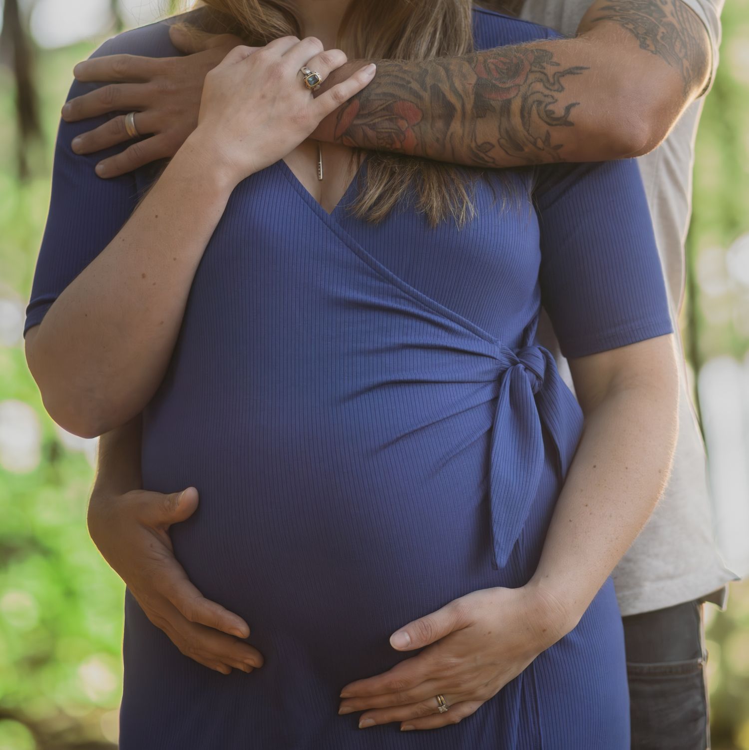 A series of maternity photos showing a couple embracing in casual attire.