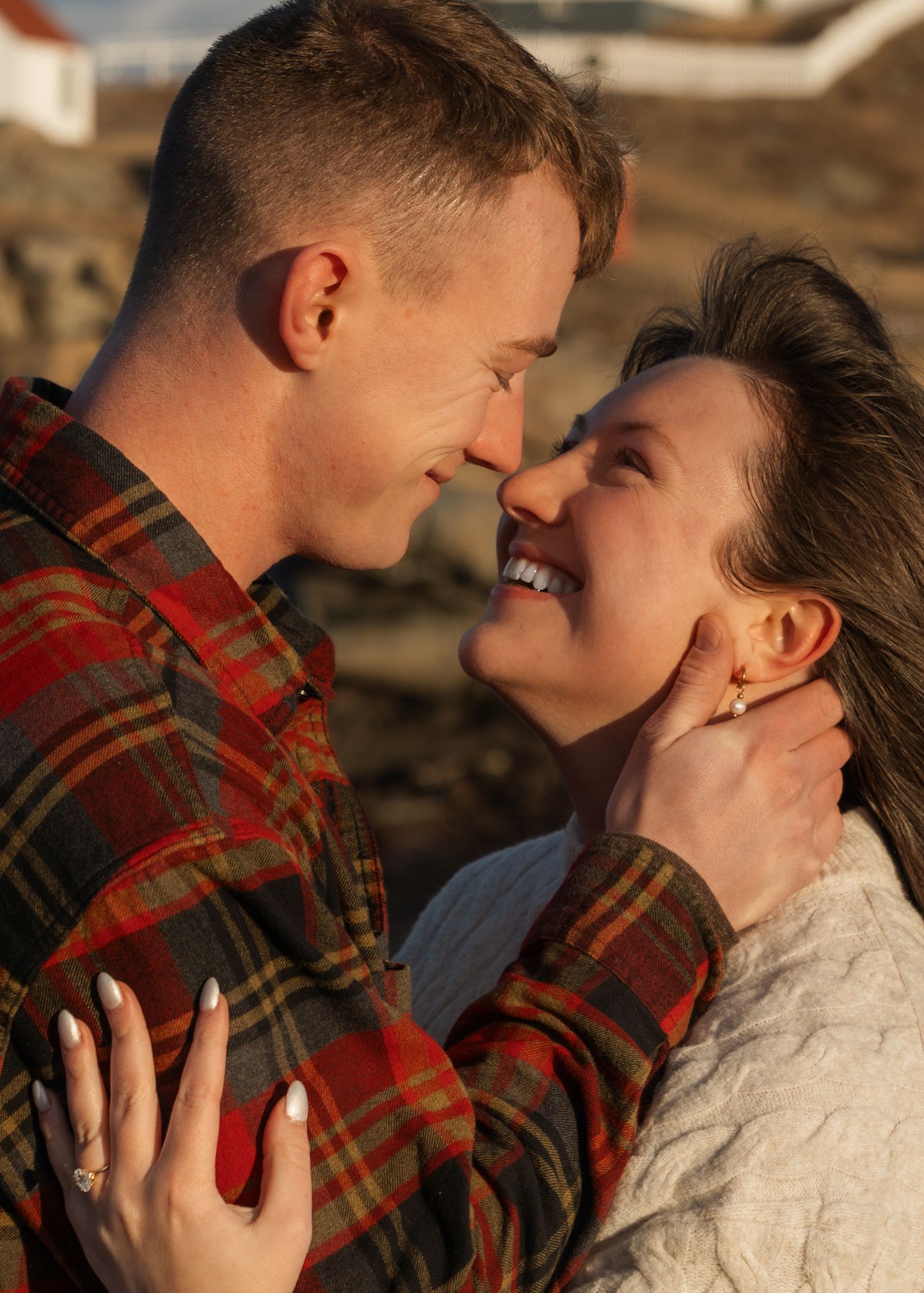 A romantic sunset photoshoot with cozy plaid and knit sweater styling.