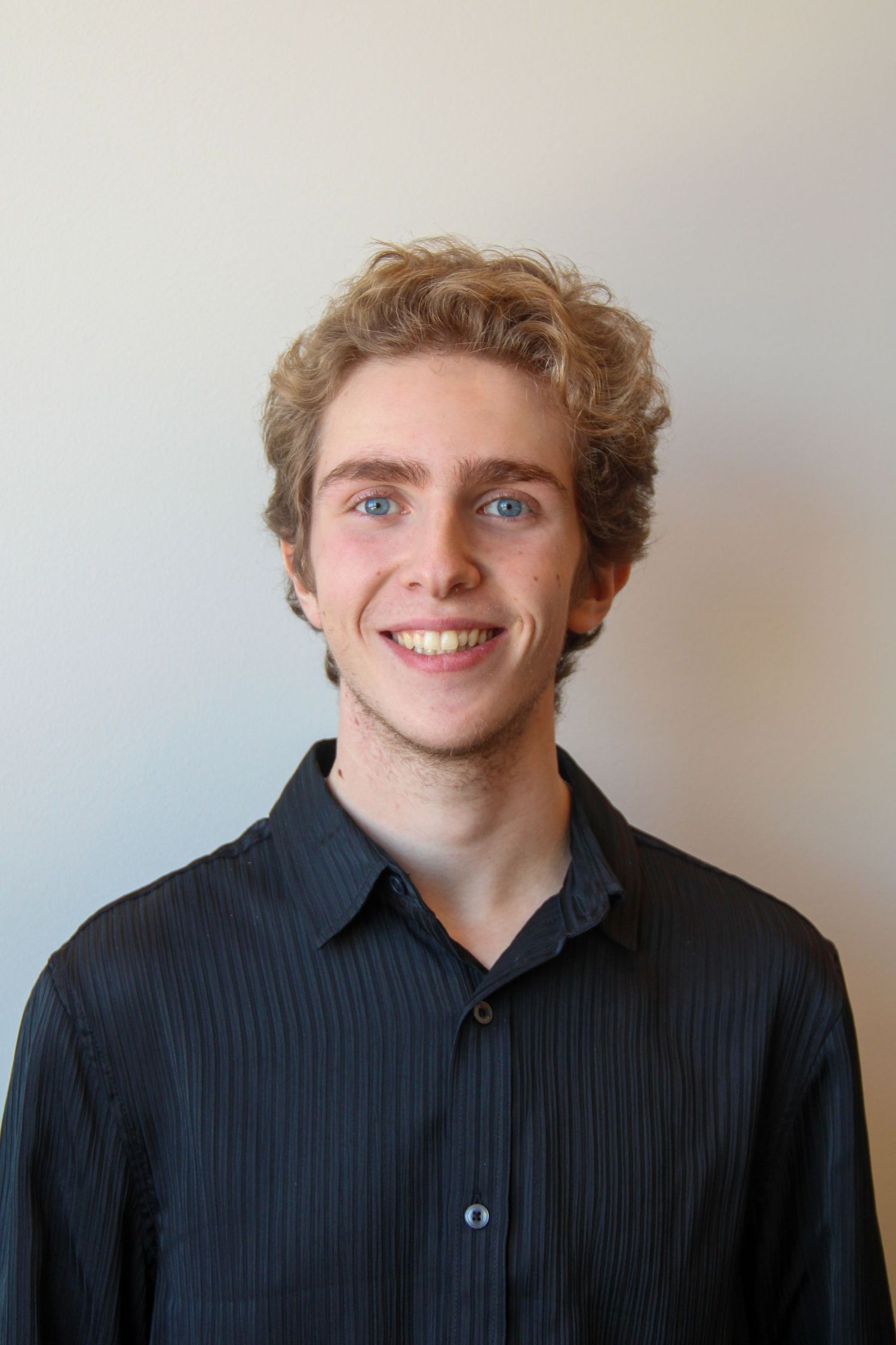 A man smiling at the camera