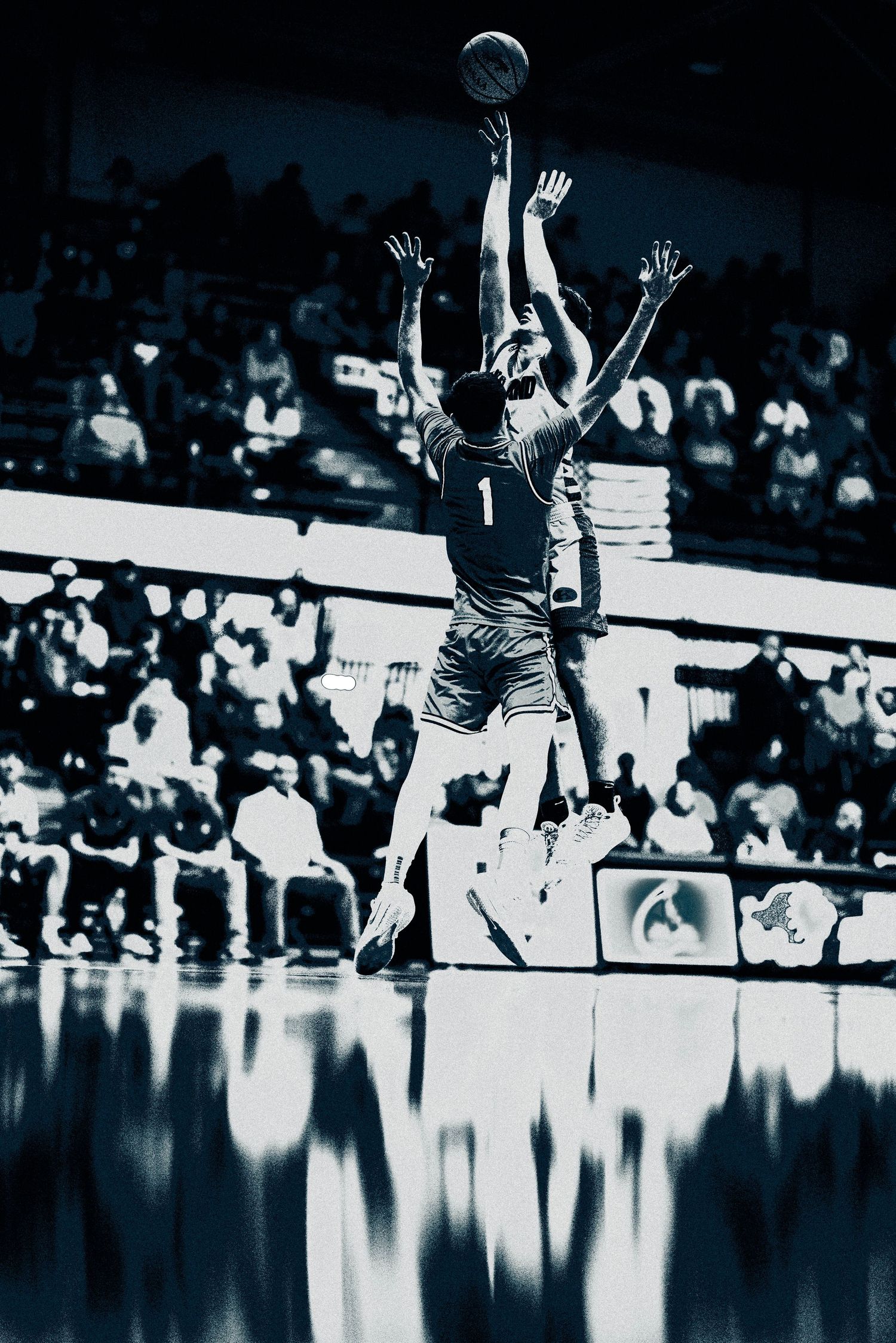 Basketball player shooting over a defender in front of a packed crowd.