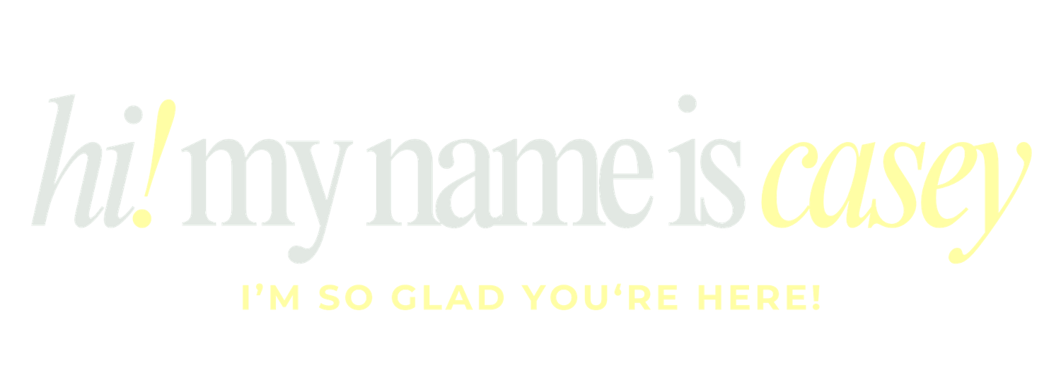 Elegant script logo reading hi my name is Casey in gray and yellow typography on white background.