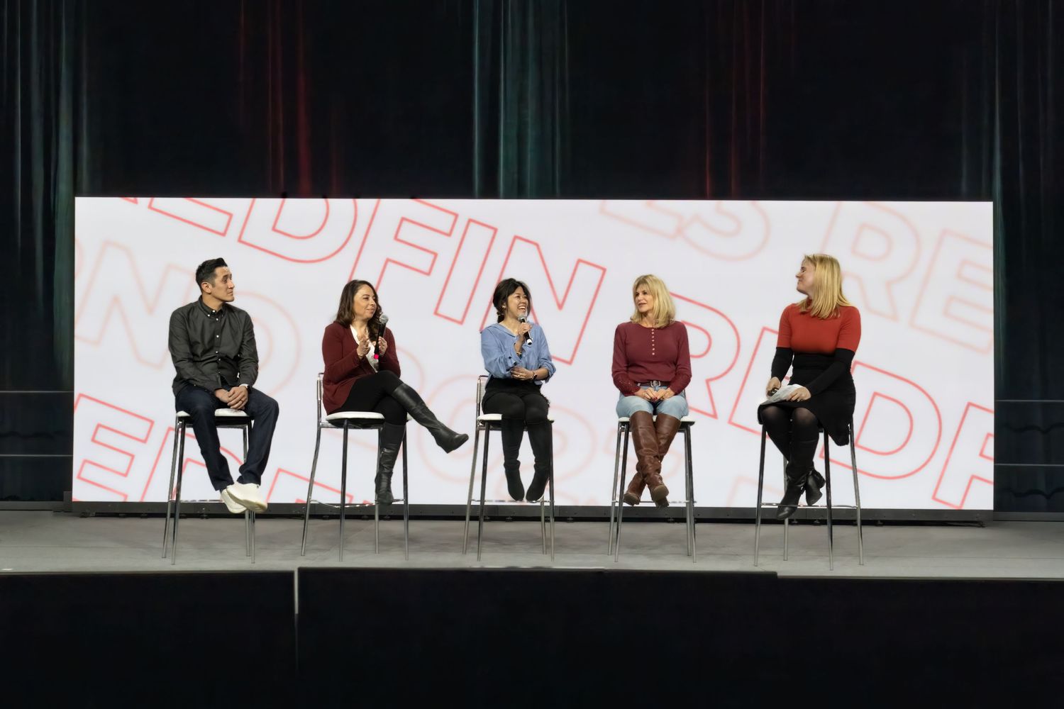 Mountain Productions image of a Corporate Panel discussion of 5 professionals on a large stage.