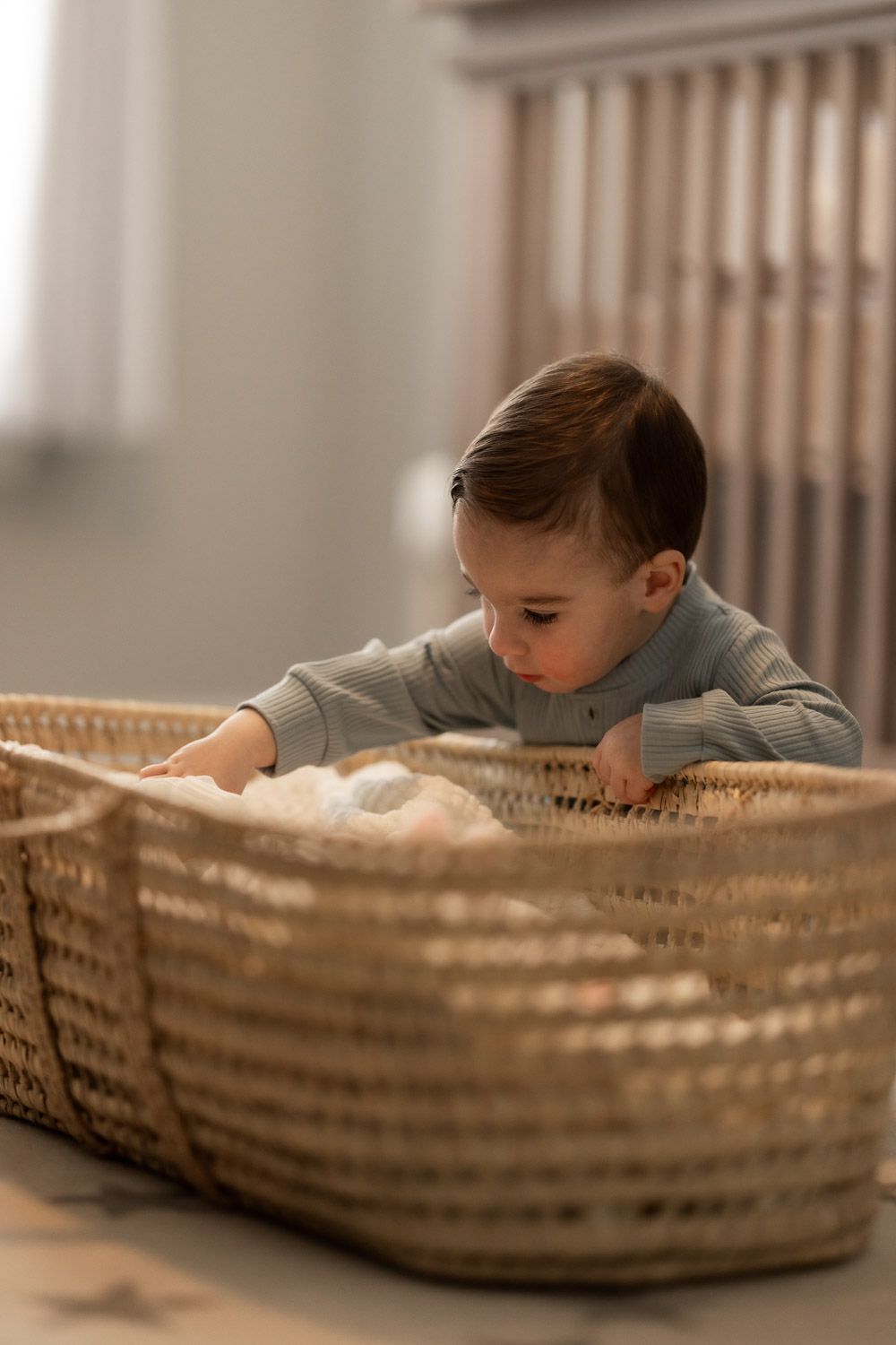 Siblings captured during in-home lifestyle newborn session in Haddonfield, NJ