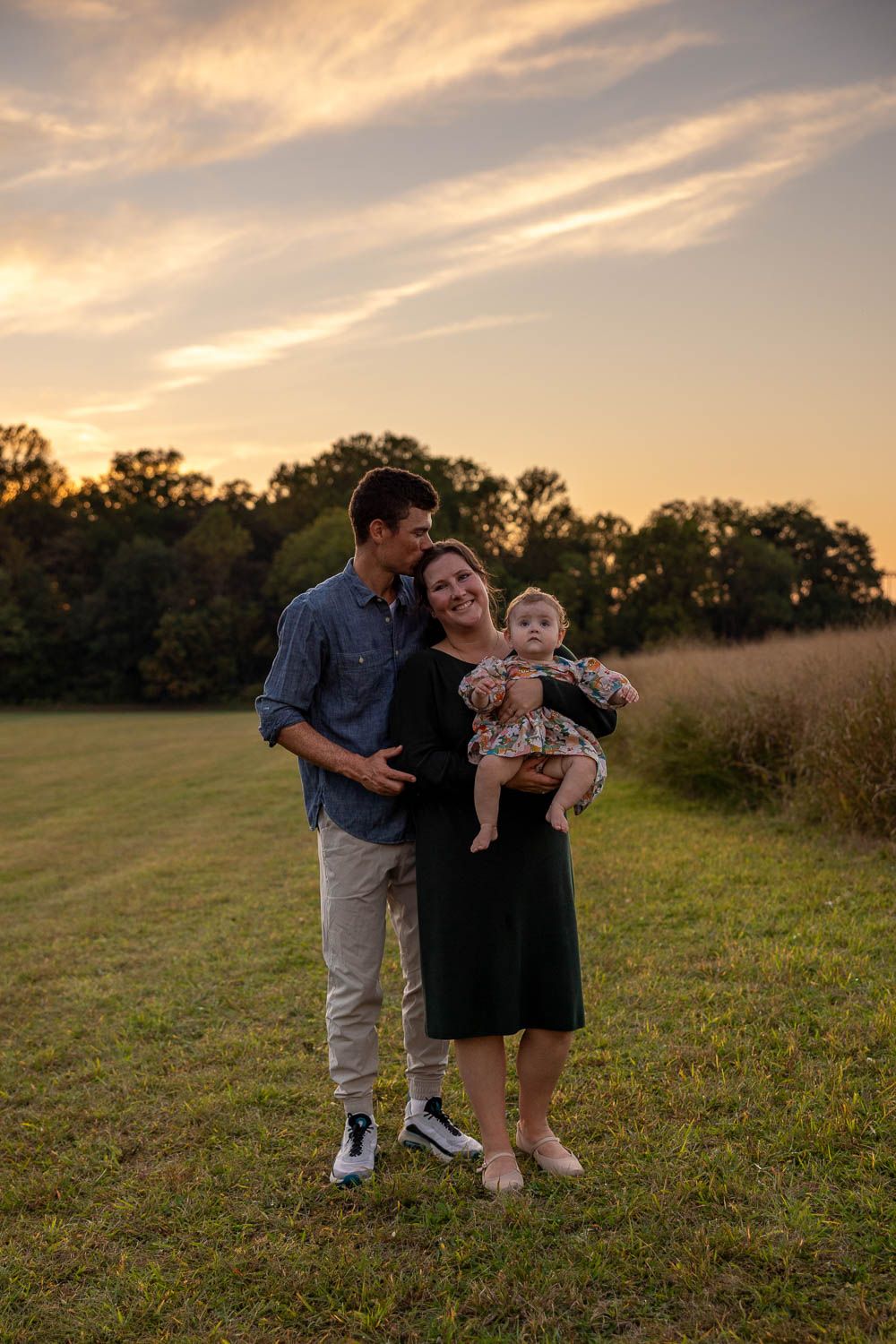 Family photo session at golden hour in field at Historic Smithville Park, Eastampton, NJ
