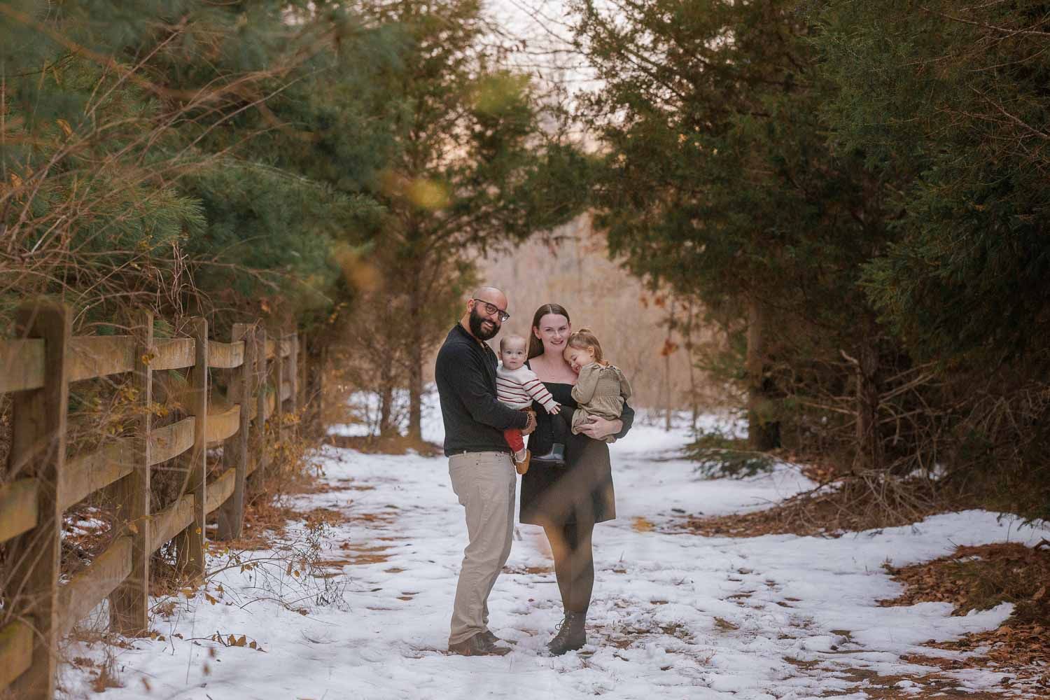 Family with two small children in photo session from Rego Photography in Moorestown, New Jersey
