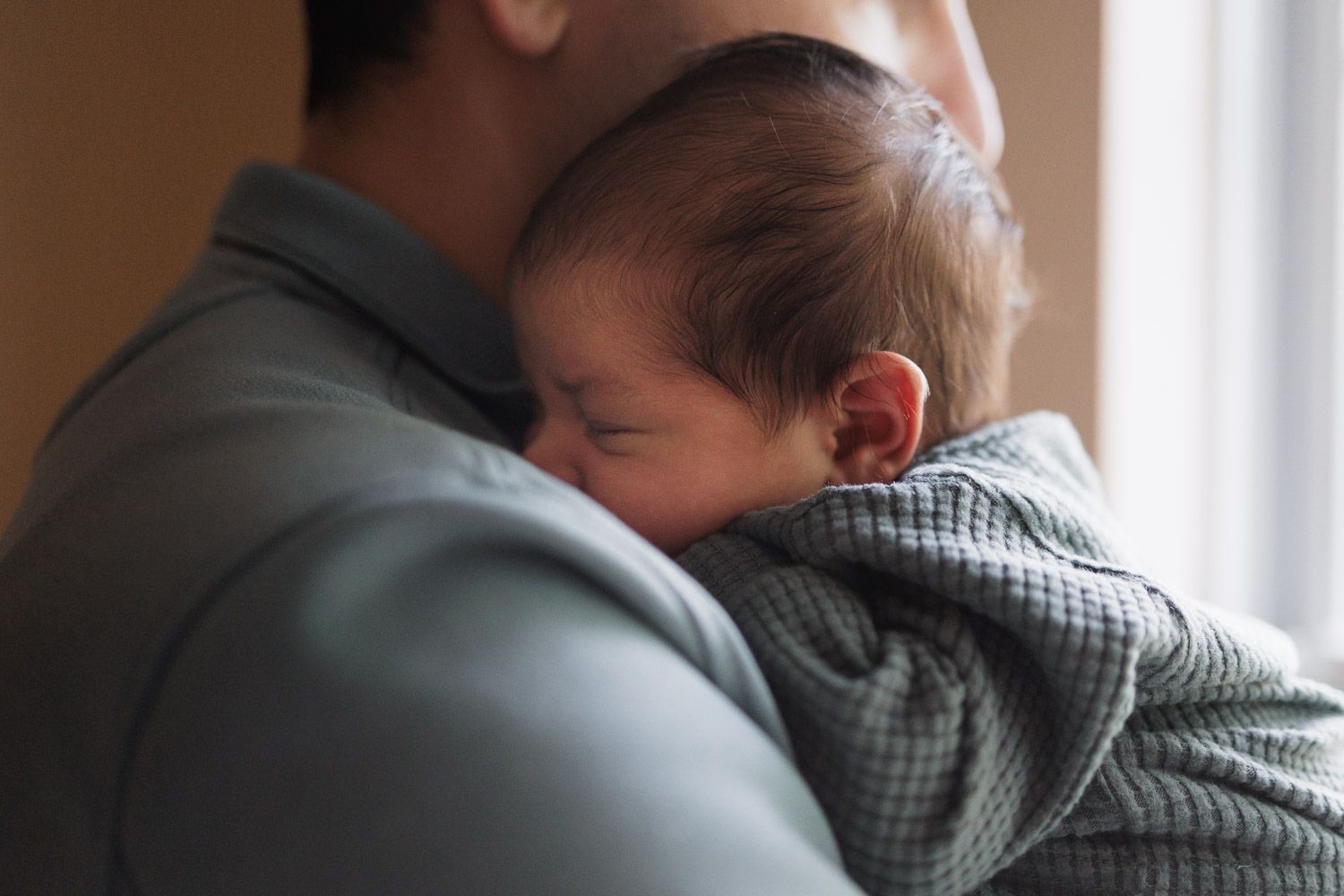 Newborn baby sleeping during in-home lifestyle newborn session in Collingswood, NJ