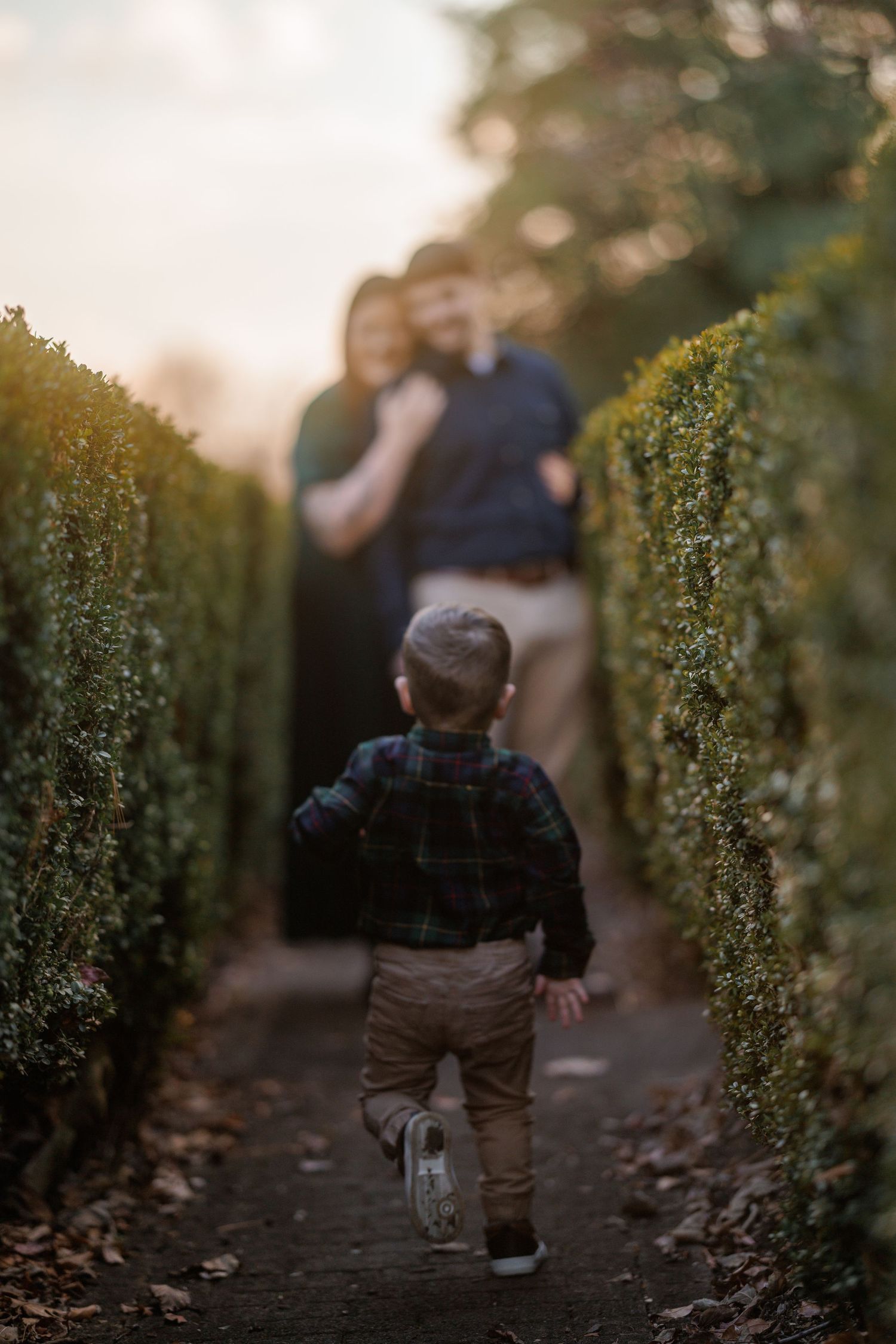 Toddler running to parents in family photo session at Smithville Park, Burlington County, NJ, by Rego Photography, family photographer