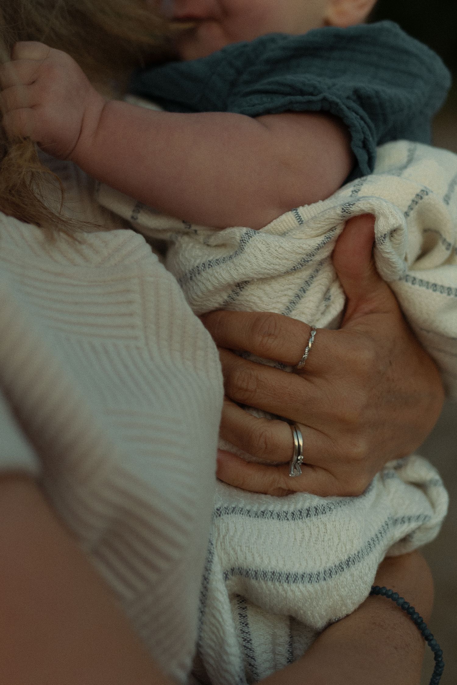 close up of mom holding young son