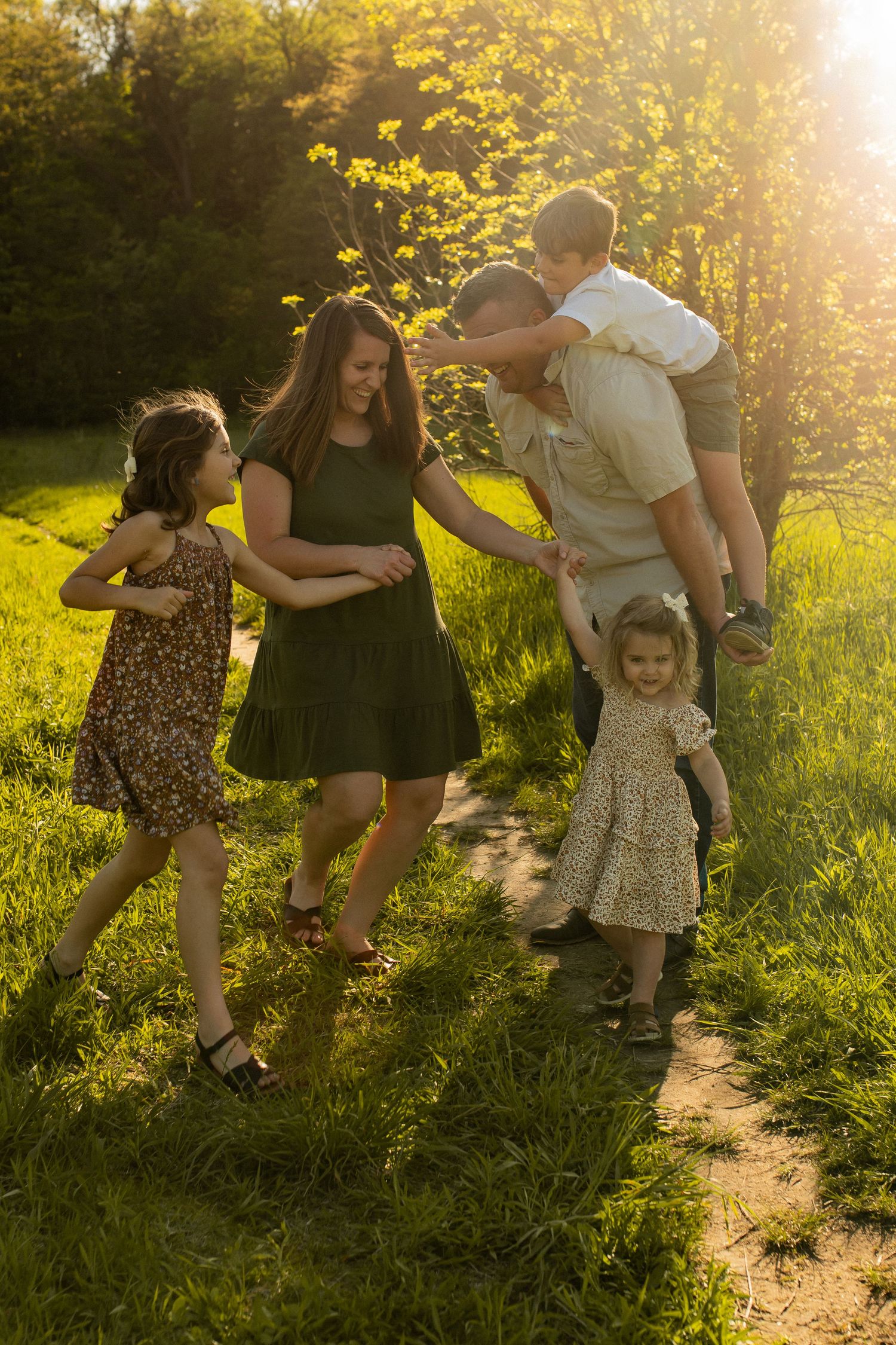 Family at sunset holding hands