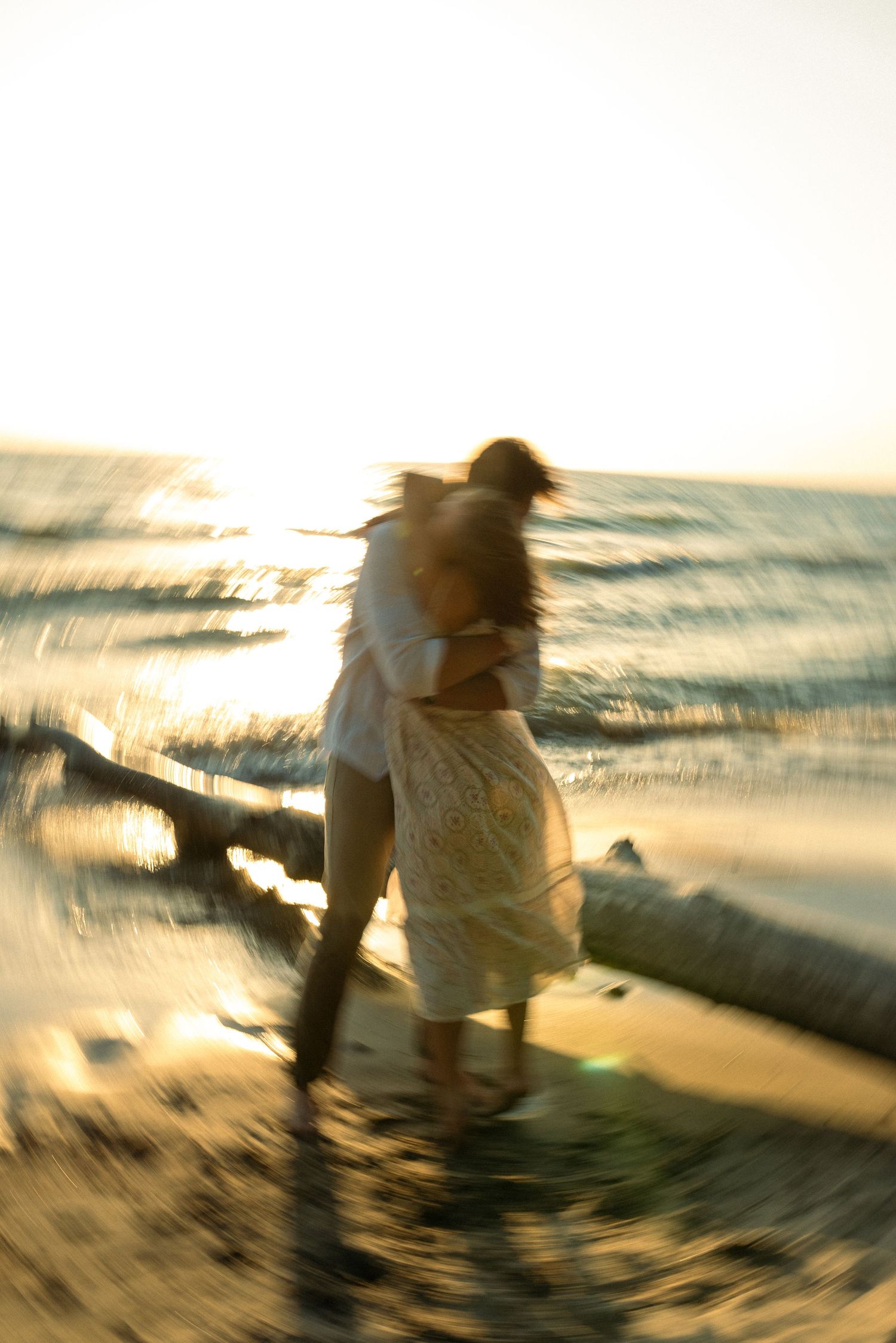 couple hugging at the beach