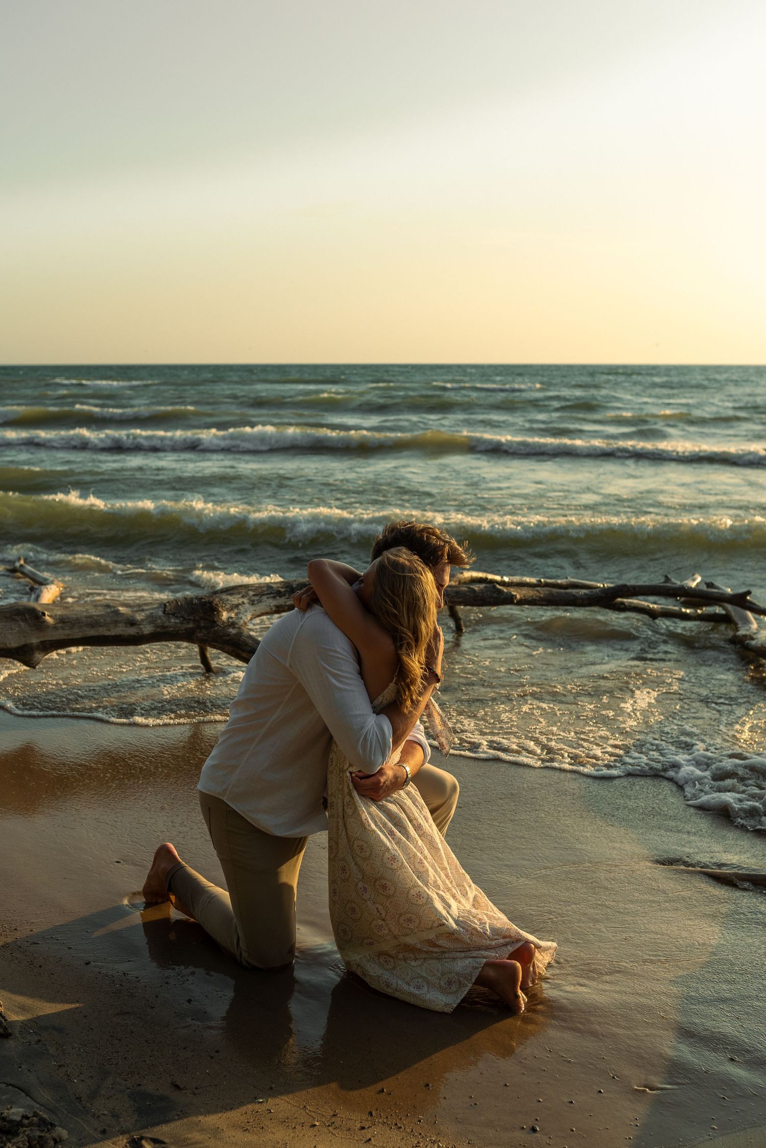 Couple hugging on the beach