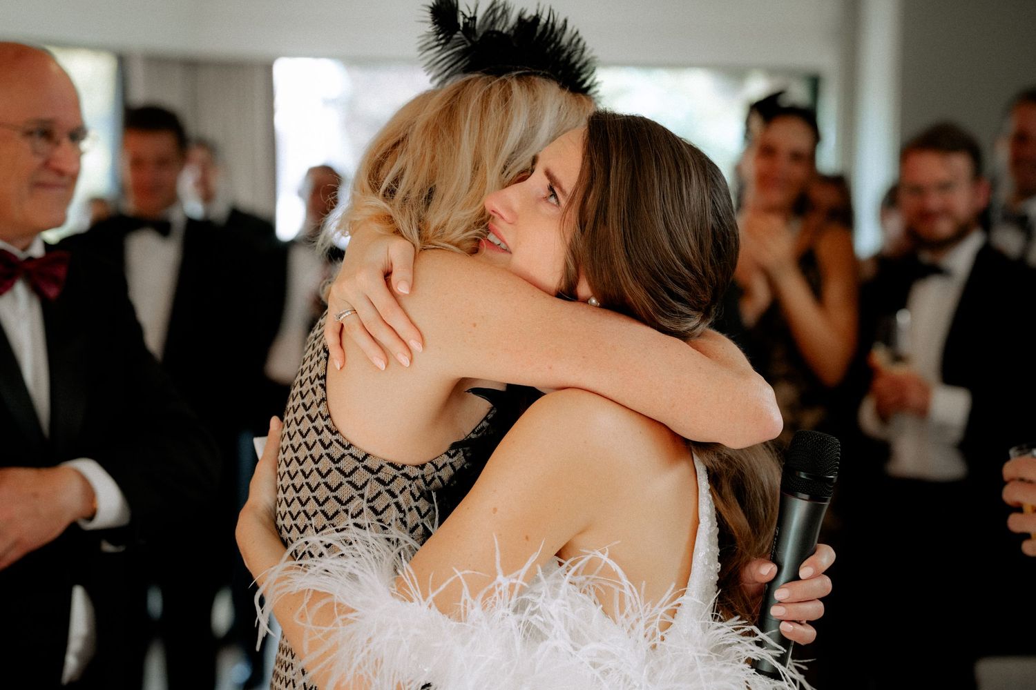 Bride hugs her mom after an emotional speech