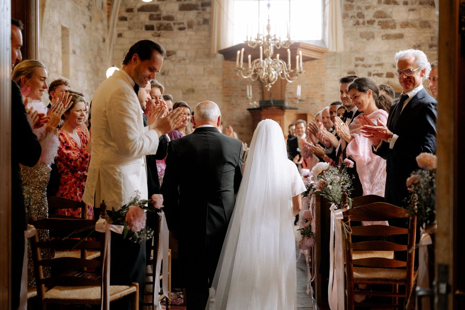 dad and daughter in the wedding day going to altar