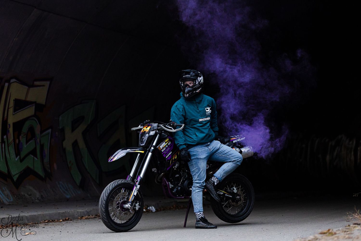 A motorcycle stunt sequence showing multiple frames of a rider performing tricks in dark lighting conditions.