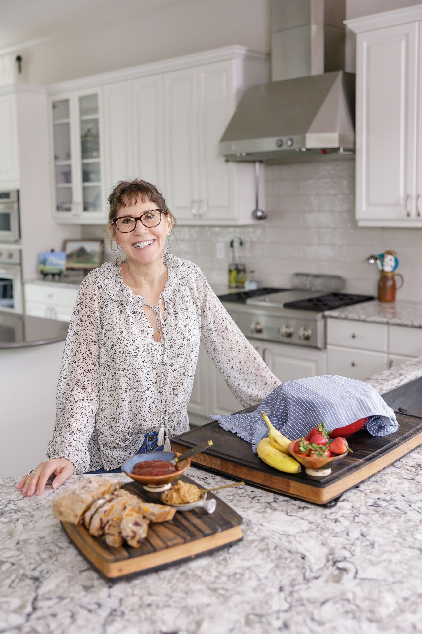 woman's health and addiction coach motivational speaker business owner personal branding lifestyle standing in kitchen Bonney Lake, WA