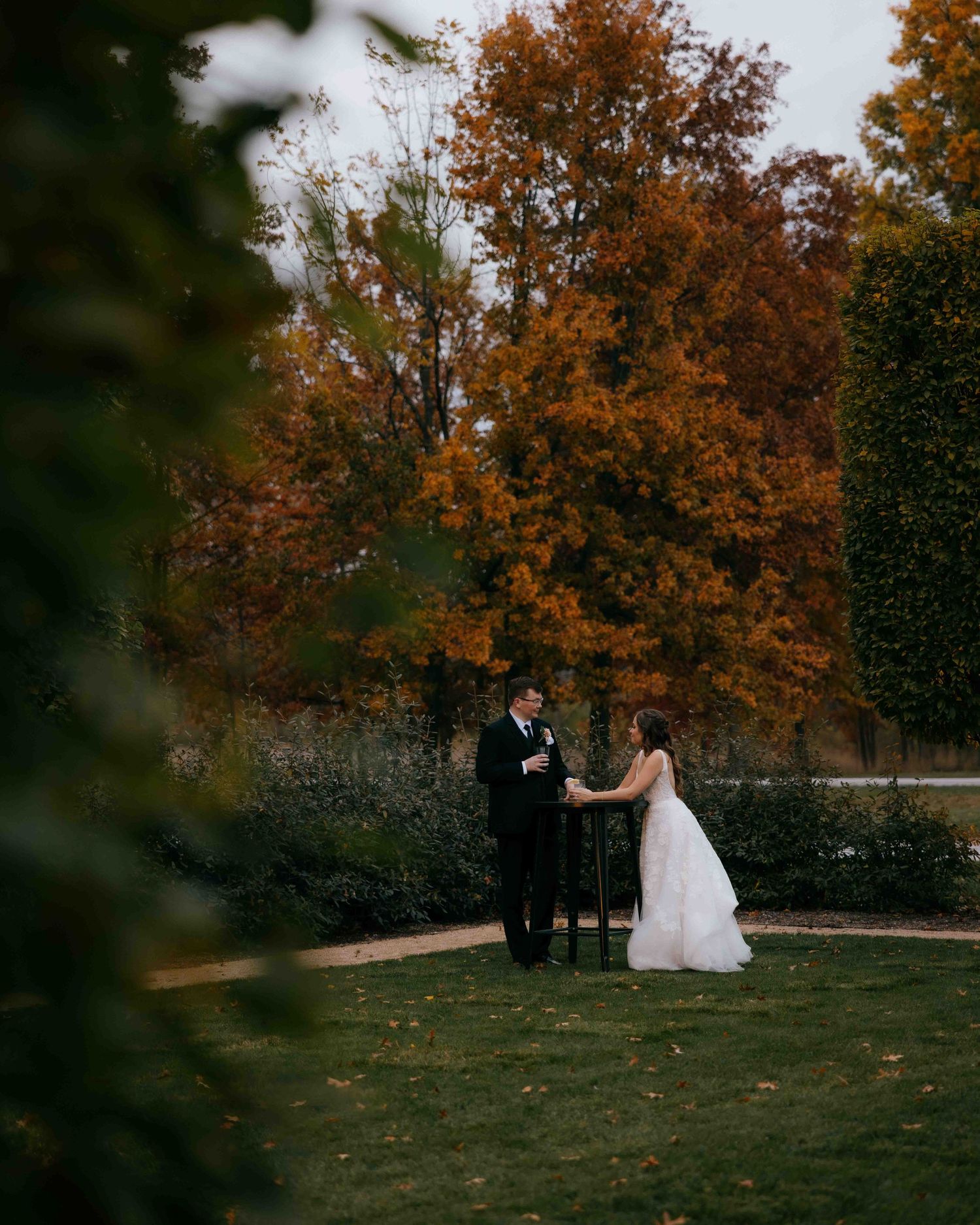 A couple sharing a private, candid moment during a fall wedding in Cleveland Ohio.