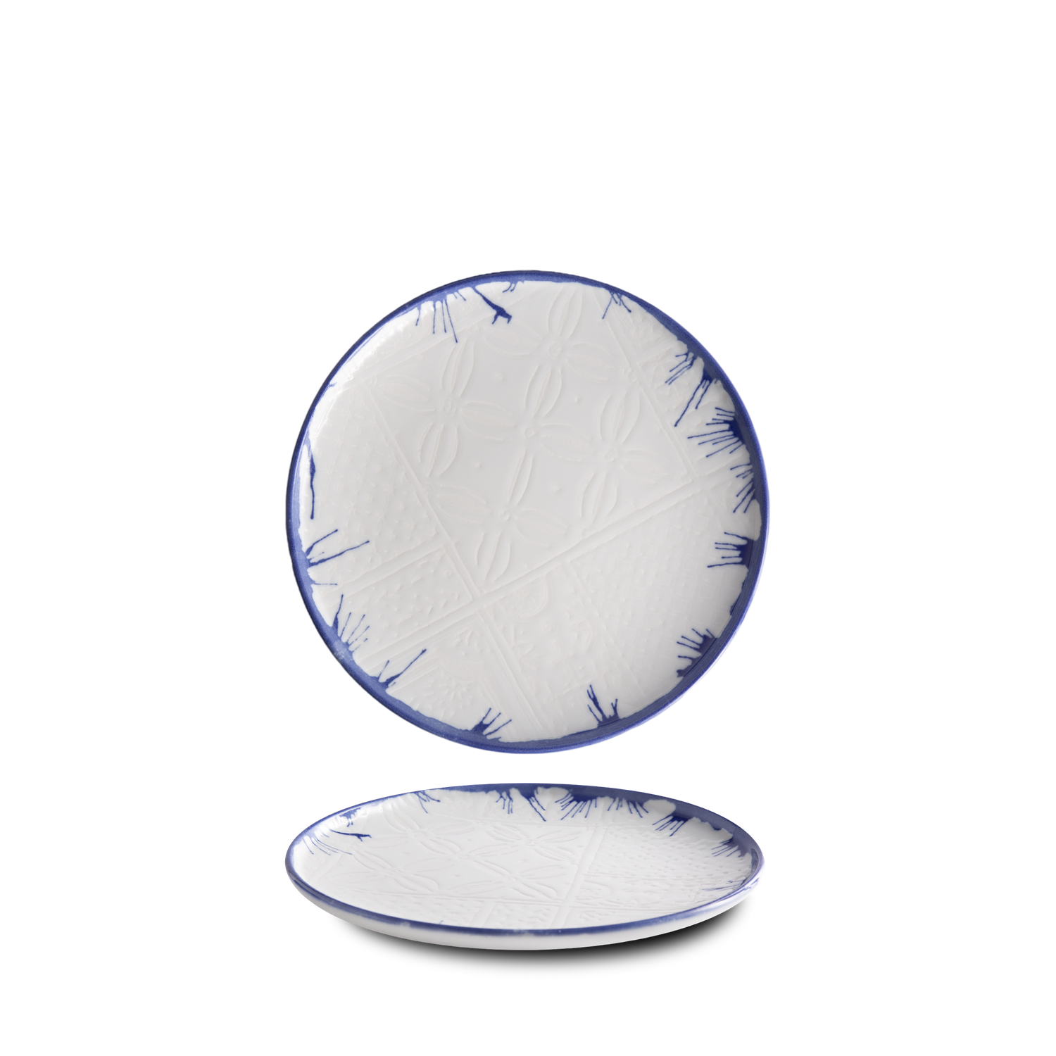 Digitally printed porcelain plates and bowls with mosaic patterns, arranged on a hard porcelain.