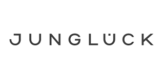 Minimalist black text logo for Jungluck brand with thin capital letters spaced evenly against white background.