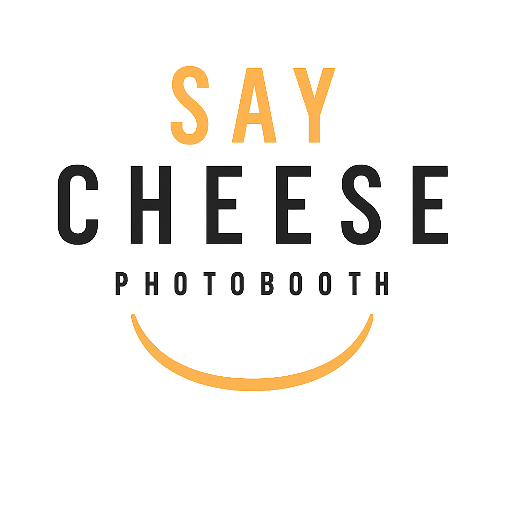Orange text reading SAY CHEESE with smiley face icons on a white background for a photo booth company.