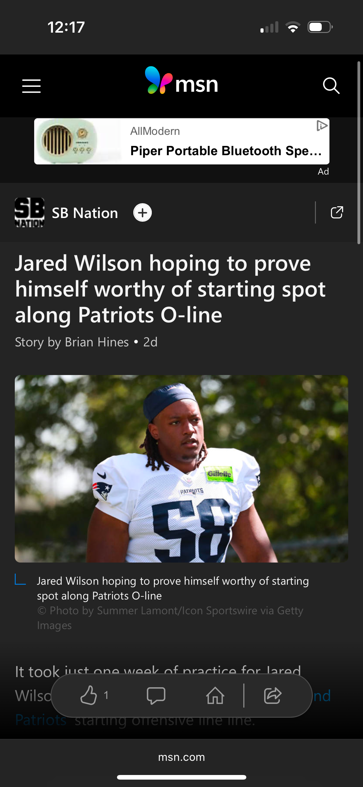 Patriots offensive lineman practices during training camp session at team facility.