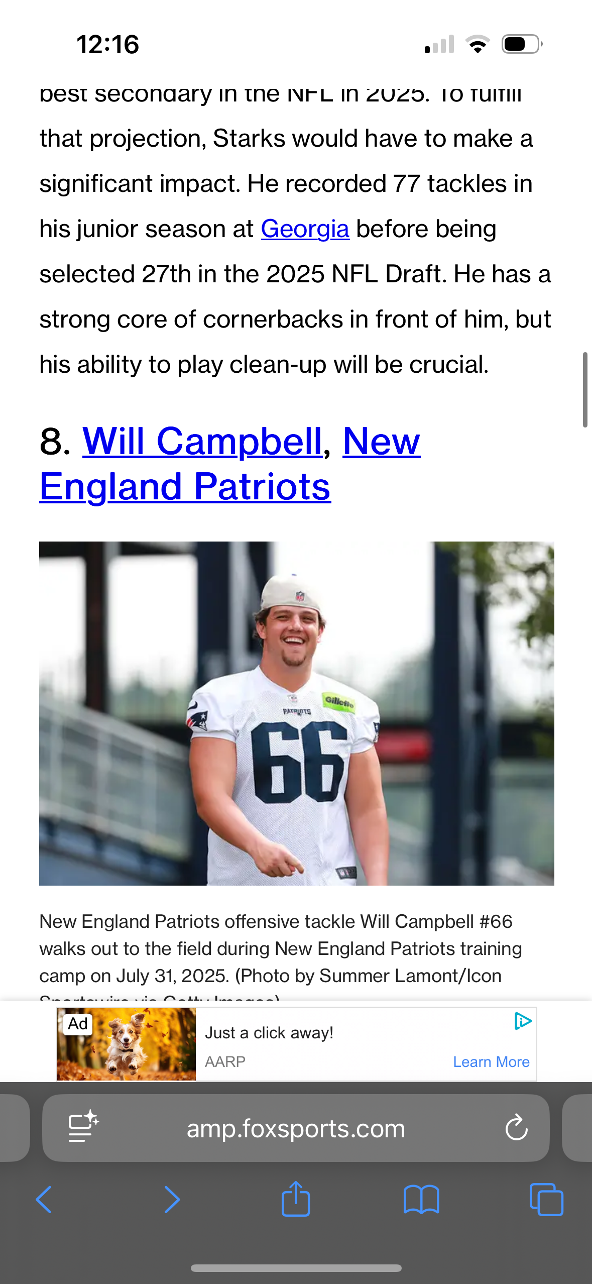Patriots offensive tackle Will Campbell walks onto practice field during training camp.