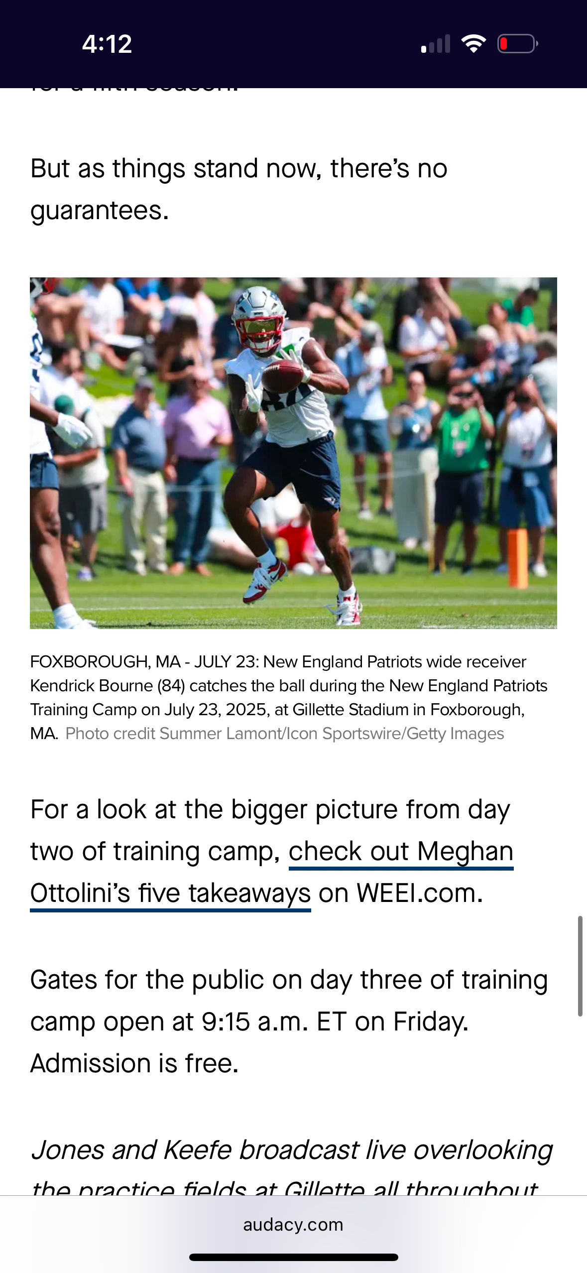 Wide receiver catches ball during Patriots training camp practice session.