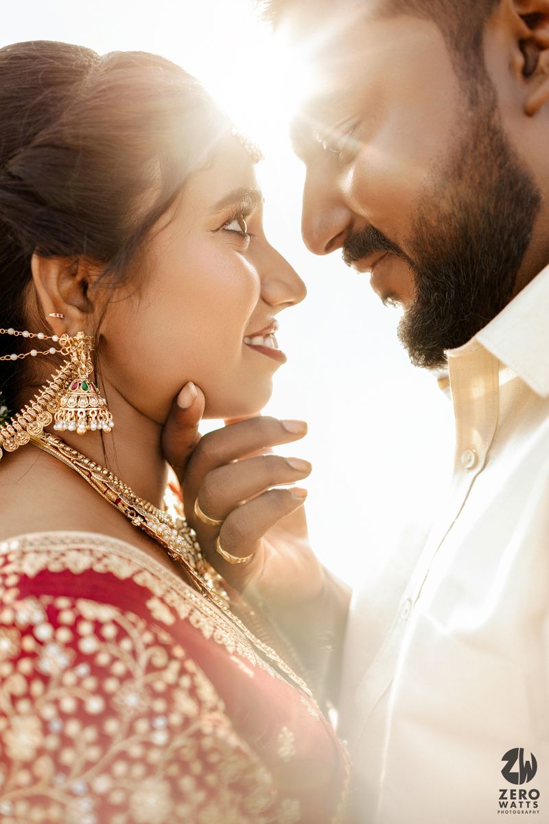 A romantic couple in traditional Indian wedding attire share intimate moments in a series of backlit golden portraits.