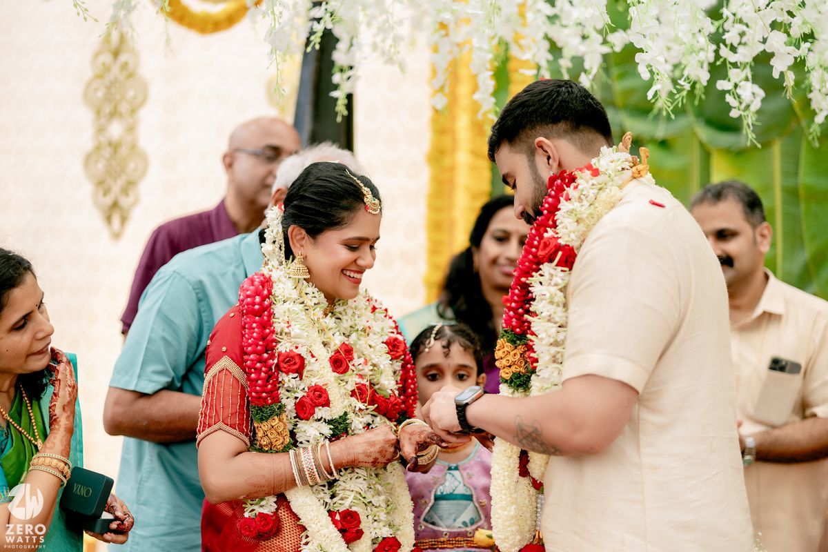 A collage of wedding ceremony moments showing traditional Indian rituals and celebrations with guests in colorful attire.