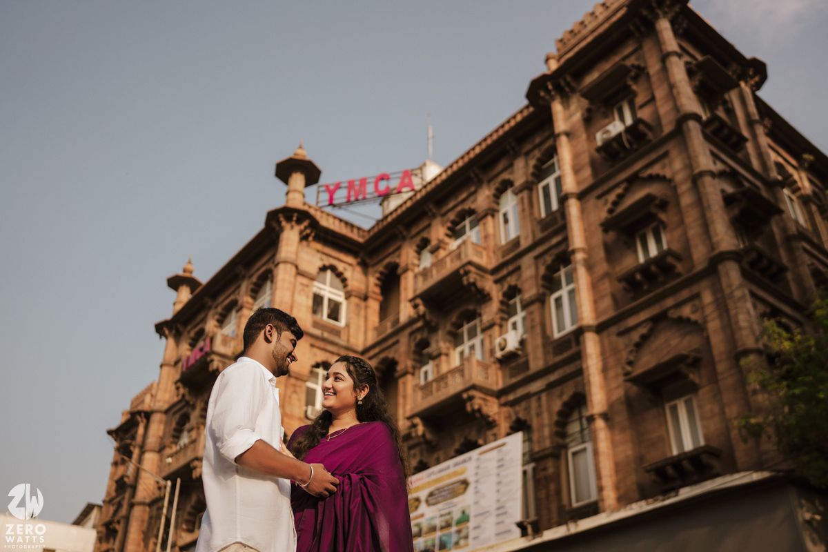 Vintage colonial architecture photographed from a low angle with ornate details and windows.
