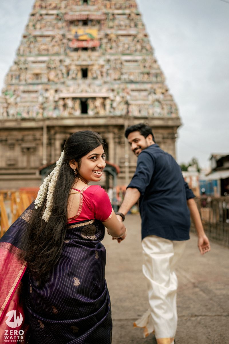 Series of romantic poses captured in front of majestic South Indian temple architecture.