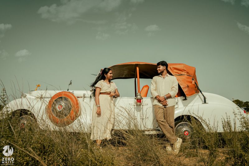 Artistic panoramic shot of a couple in a field with vintage styling and muted green tones.
