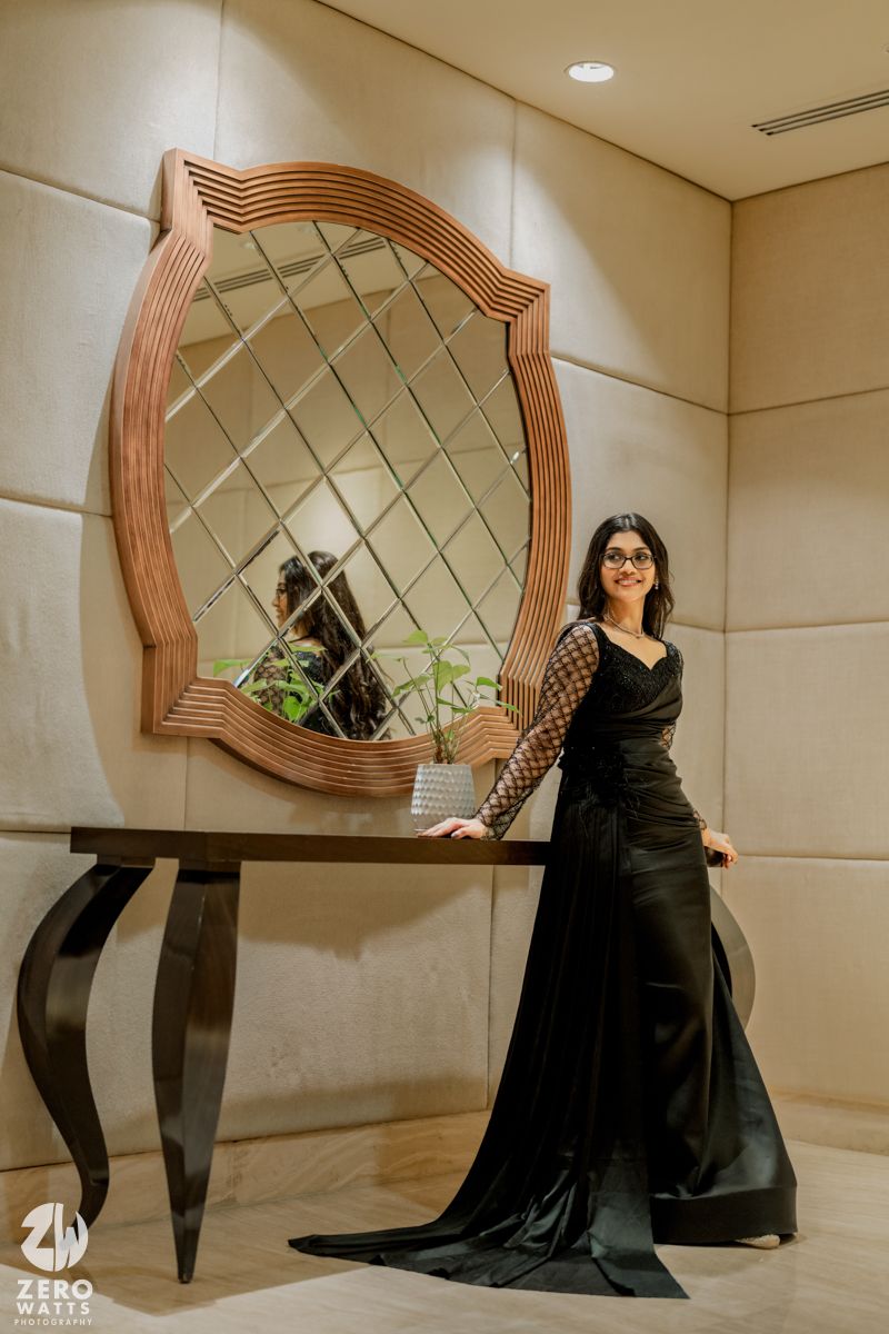 Dramatic fashion poses captured in sequence against decorative mirror and neutral wall backdrop.