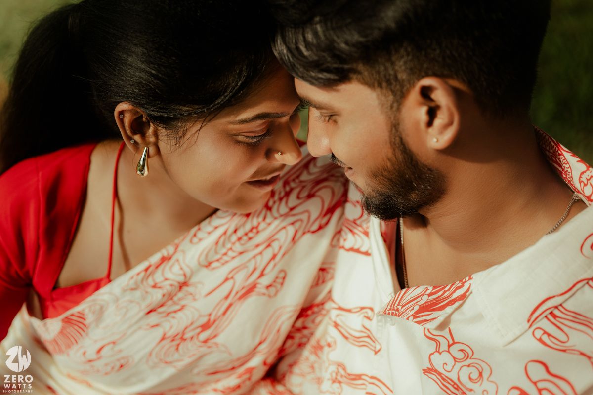 A couple in white and red attire share a tender moment together in a series of romantic photographs.