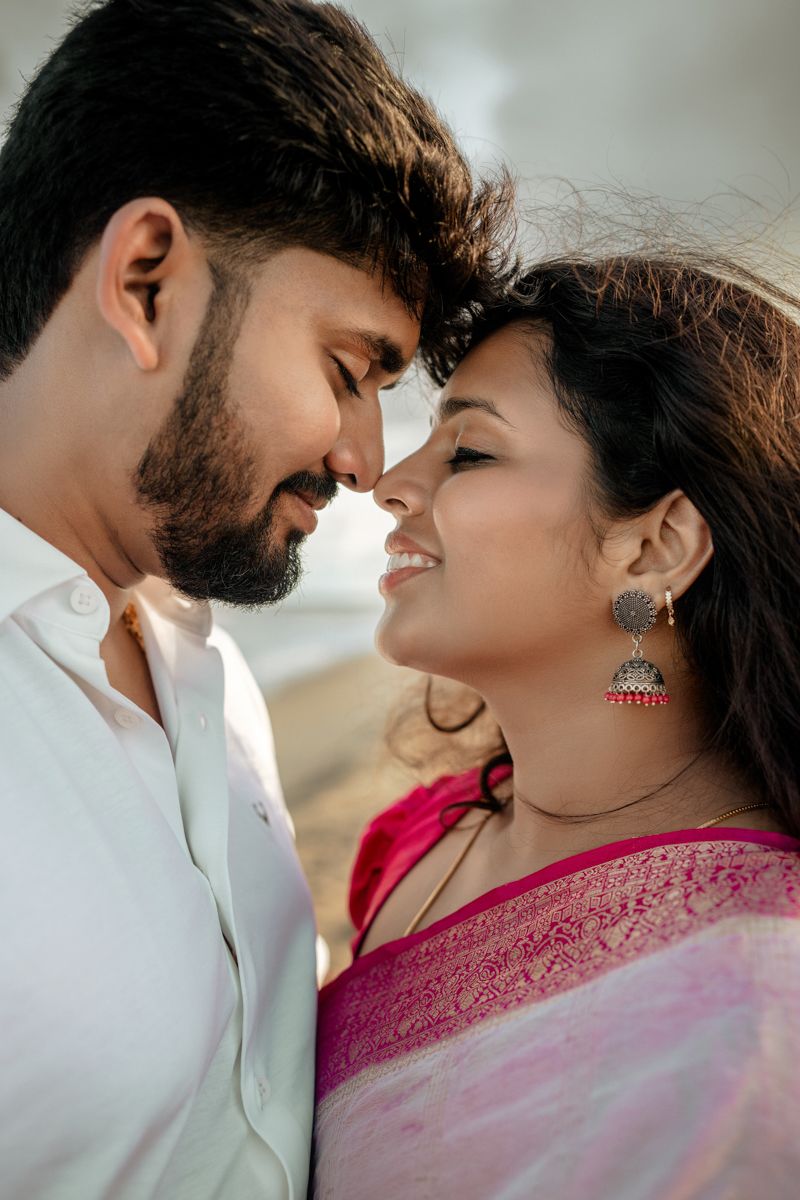 Close-up series of tender moments between couple wearing white shirt and pink saree.