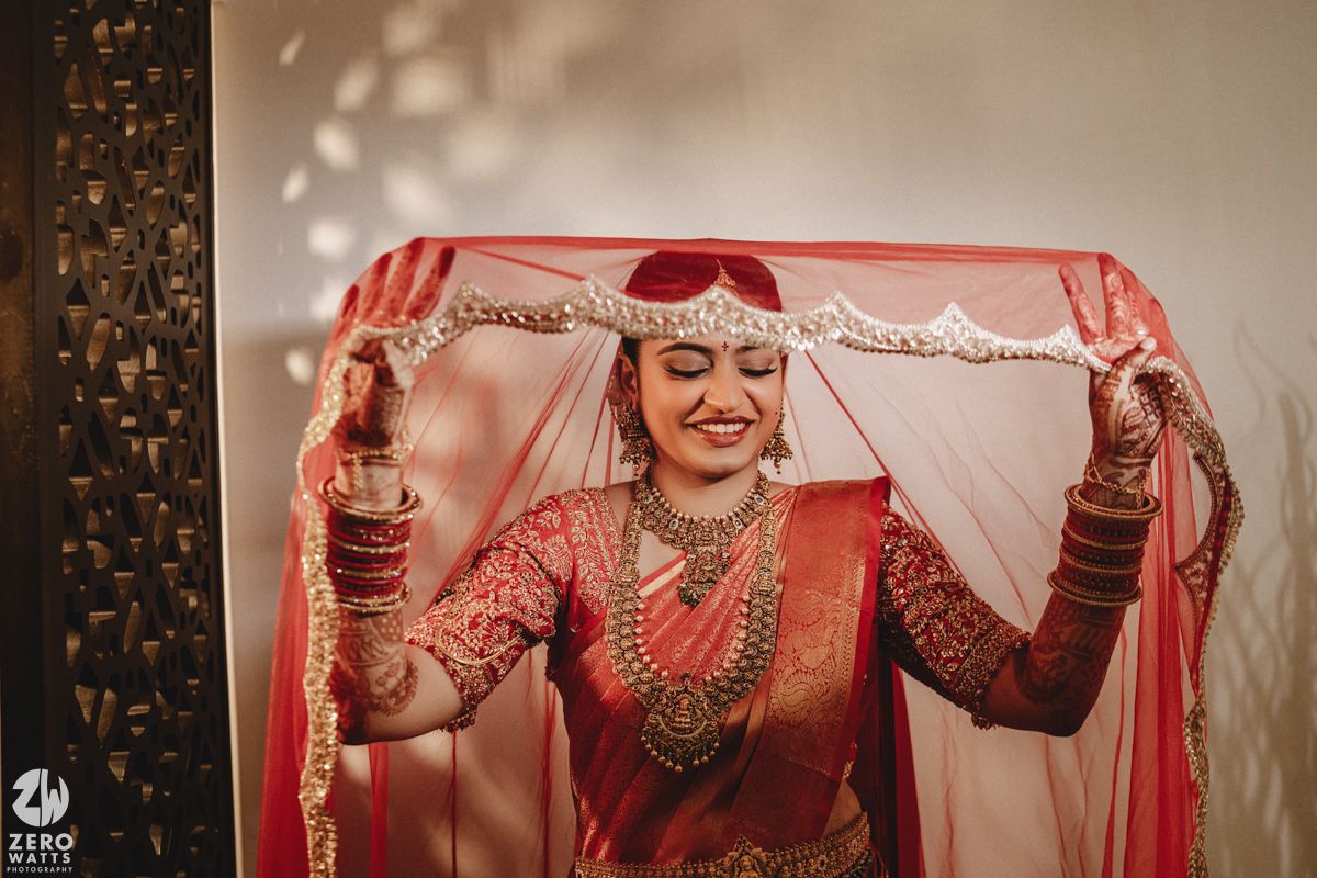 A series of traditional Indian wedding photos showing details of red bridal attire and jewelry in warm tones.