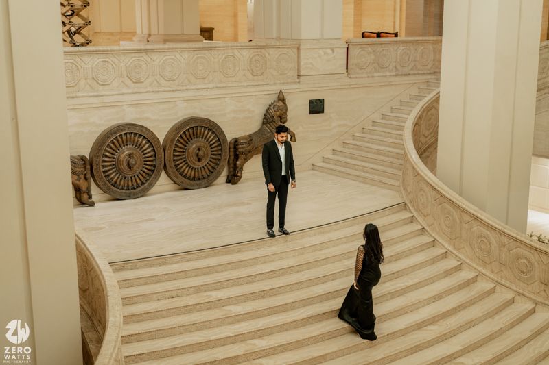 Grand marble staircase with ornate architectural details inside a museum or government building interior.