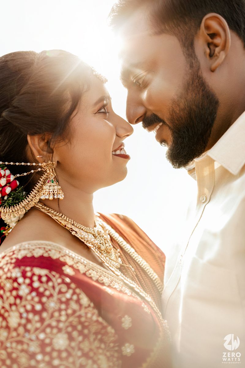 A romantic couple in traditional Indian wedding attire share intimate moments in a series of backlit golden hour portraits.