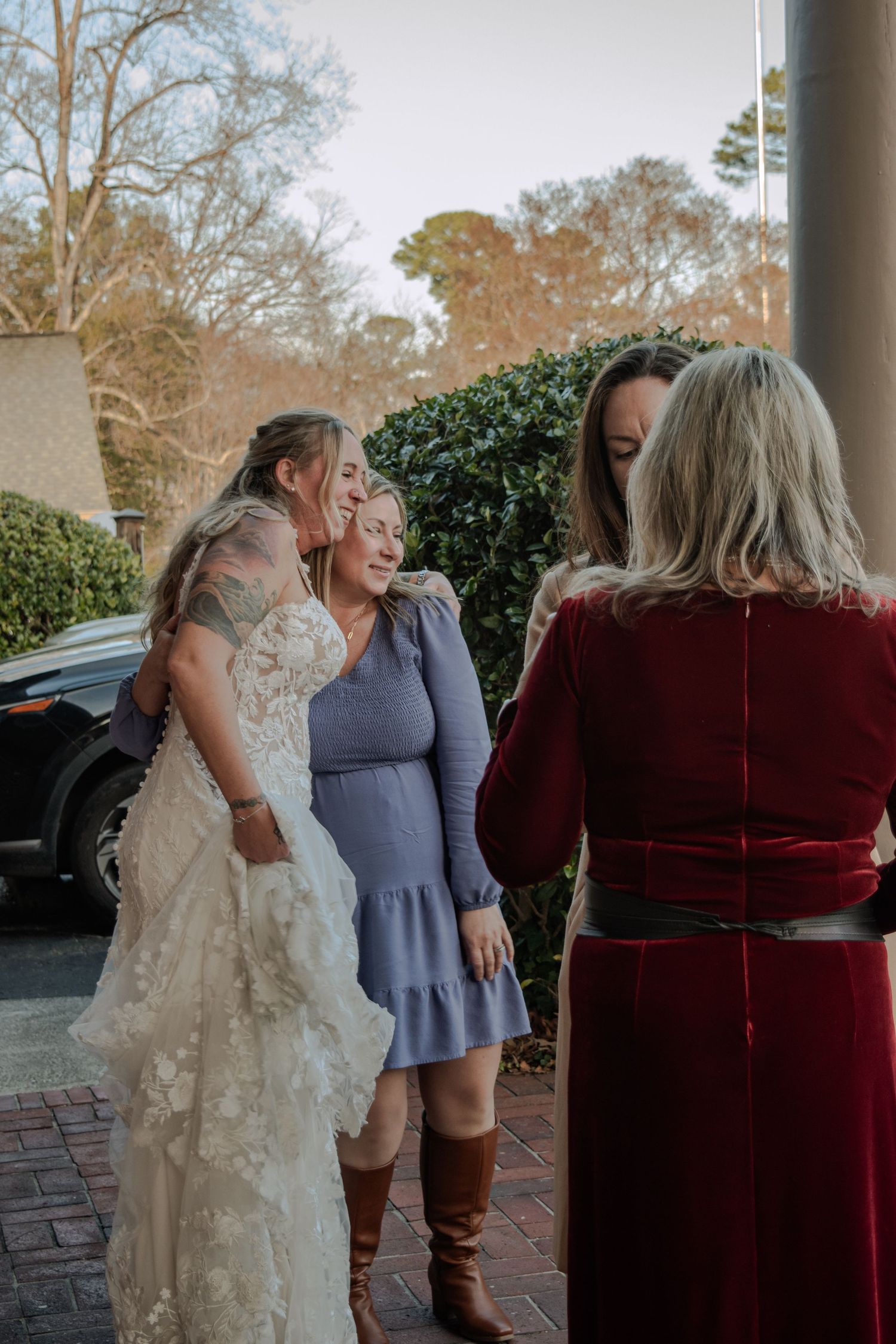 A series of candid moments showing loved ones sharing embraces and conversations in formal wear at a special event.