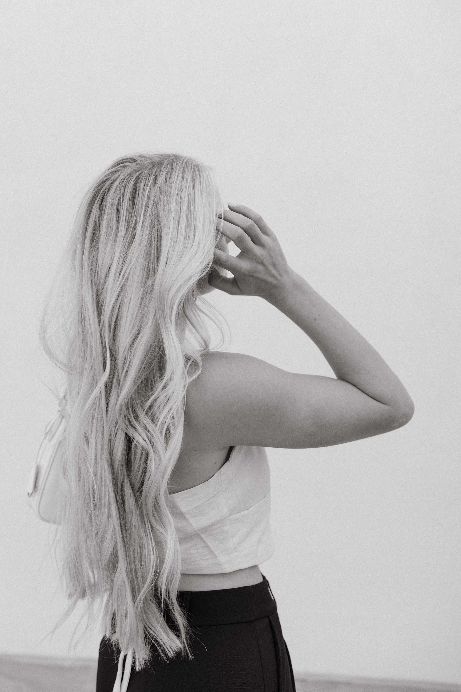 A series of black and white profile shots showing platinum blonde hair against a light background.
