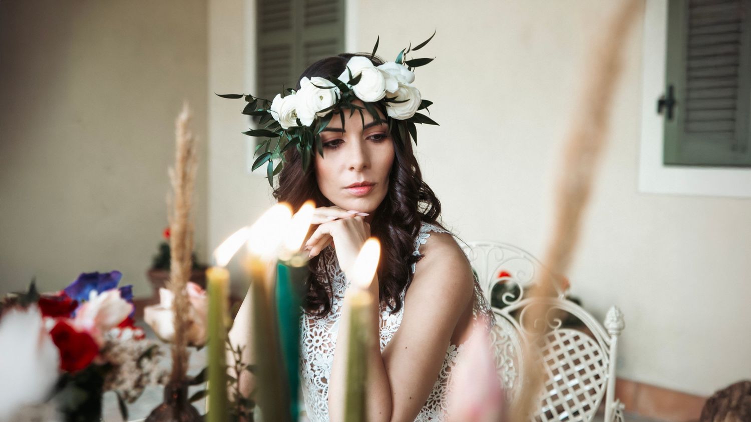 A collage of five vintage-style photos showing a woman in different romantic and dreamy poses with floral elements.