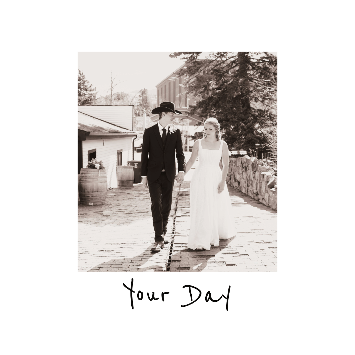 Black and white polaroid photo of bride and groom walking hand in hand down cobblestone street, Your Day.
