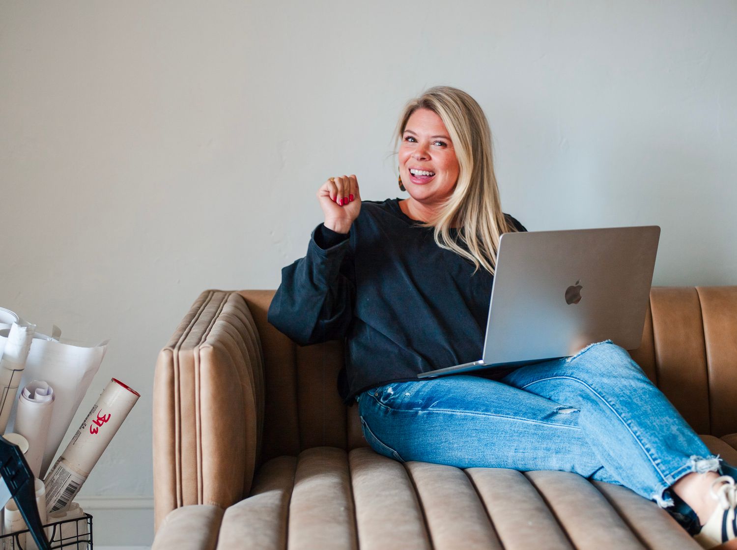 Personal branding photo session in Stanly County with Lauren of Elle Luna Interiors Design, relaxed lifestyle portrait on a leather couch