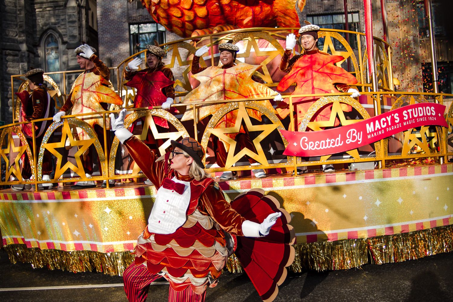 Performer smiling for the camera during the Thanksgiving parade