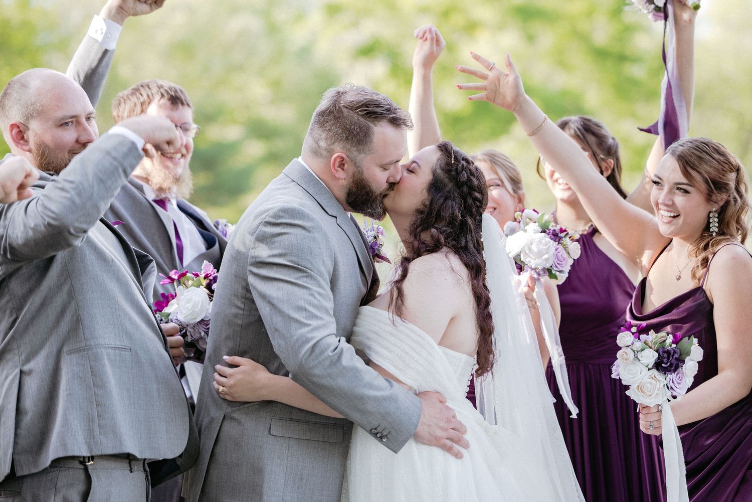 A collection of romantic wedding moments showing couples embracing and sharing intimate kisses in formal wedding attire.