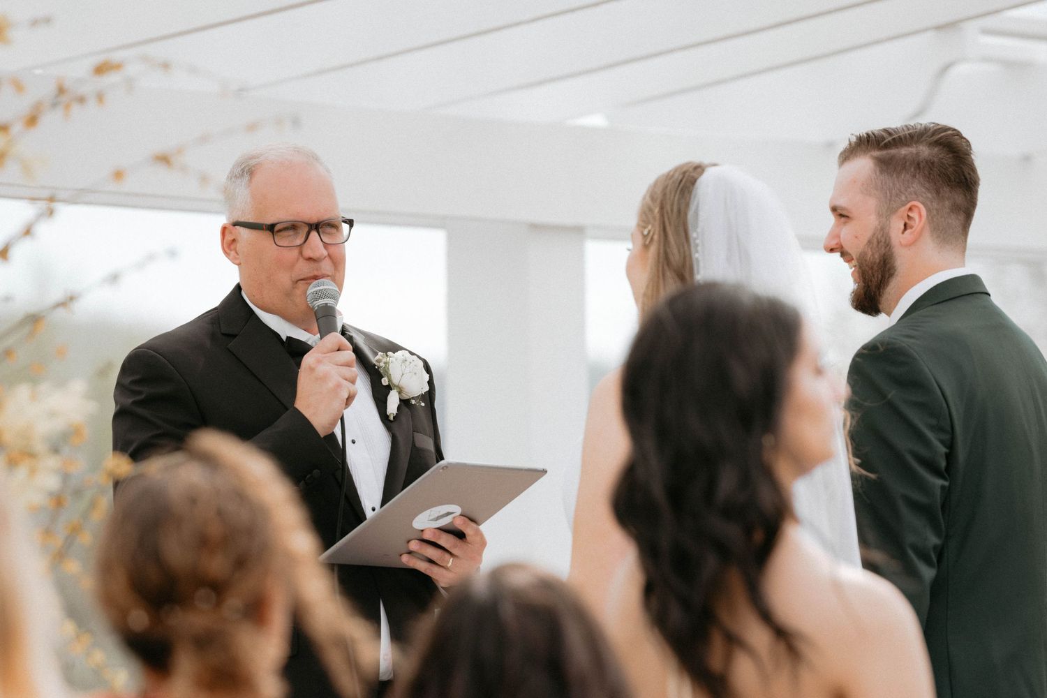 Wedding guests mingling and socializing during an elegant indoor reception.
